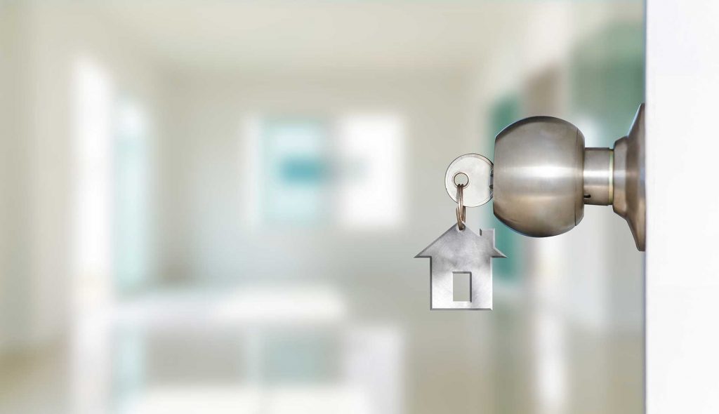Open door with keys of house